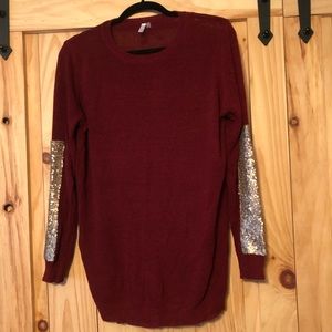 Burgundy sweater with gold sequin elbow patches